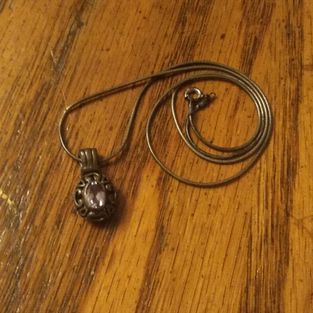 Sterling silver necklace with purple Jewel